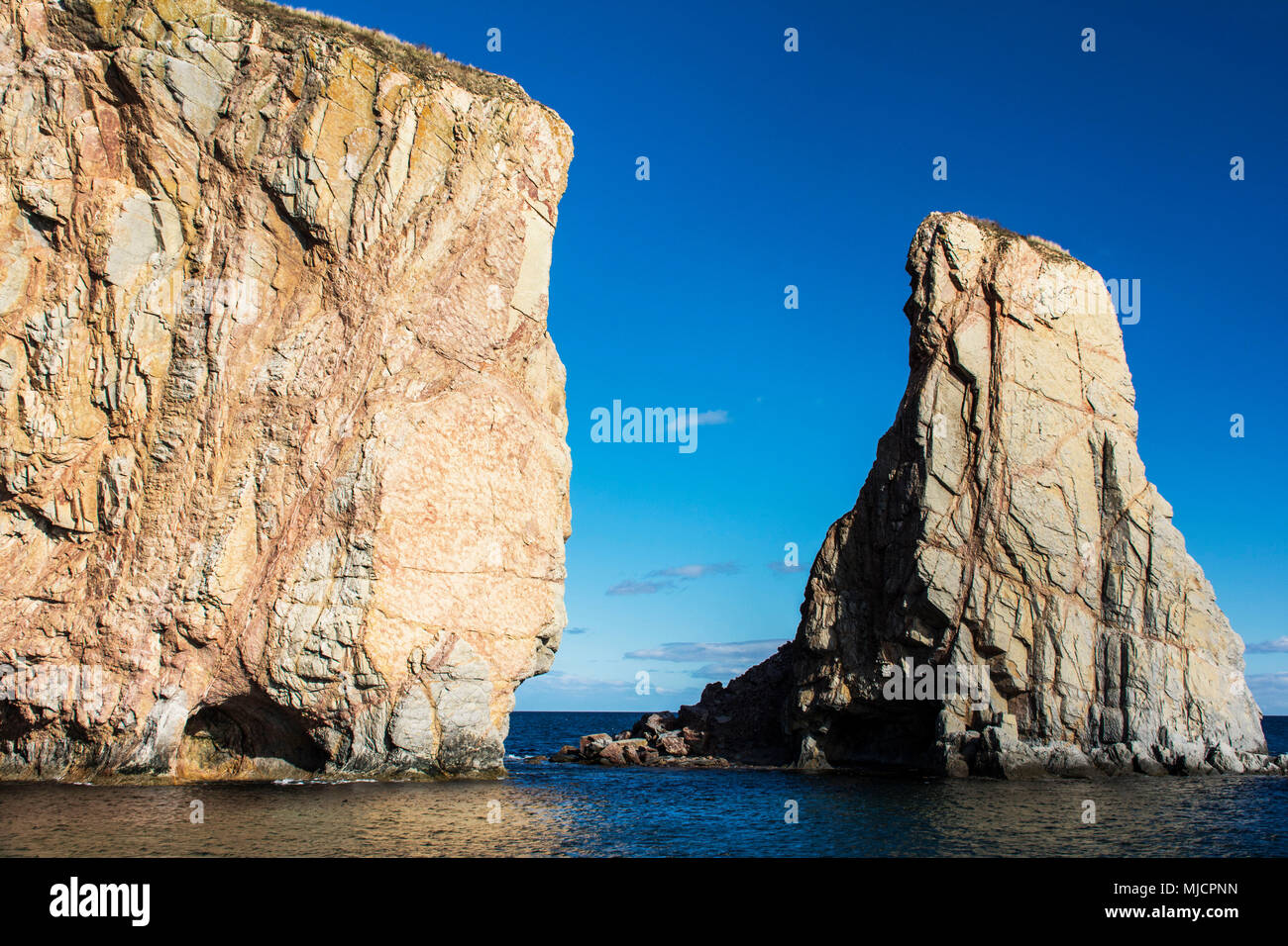 Limestone rocks 'Rocher Percé' in front of the Gaspésie Peninsula in Canada Stock Photo