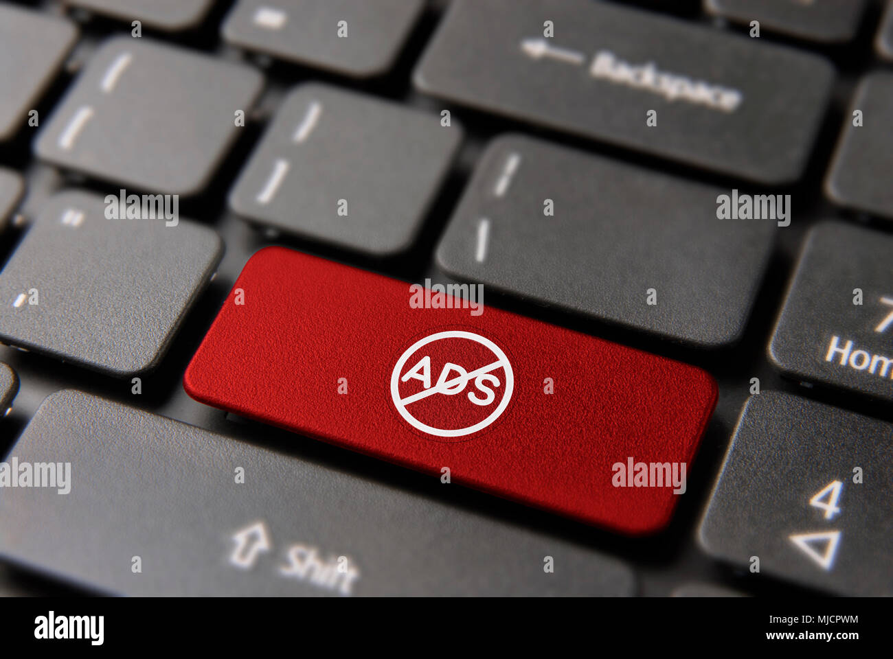 Advertisement blocker security computer button for internet safety concept. Anti ads icon key in red color. Stock Photo