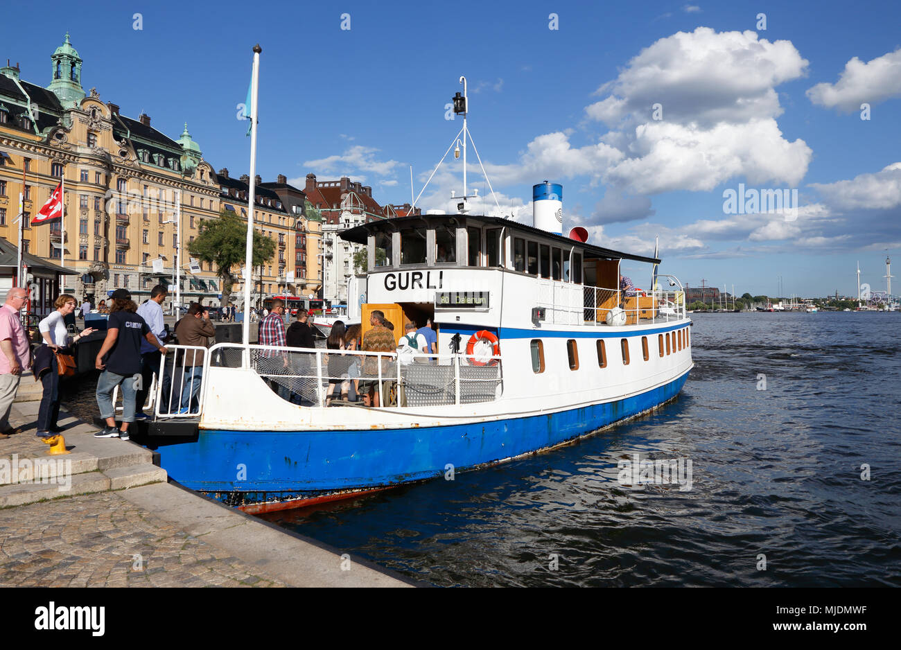 Stockholm, Sweden - July 10, 2016: The passenger ship Gurli in traffic on the Stockholm transport boat on line 80 Sjövägen has called stop Nybroplan i Stock Photo