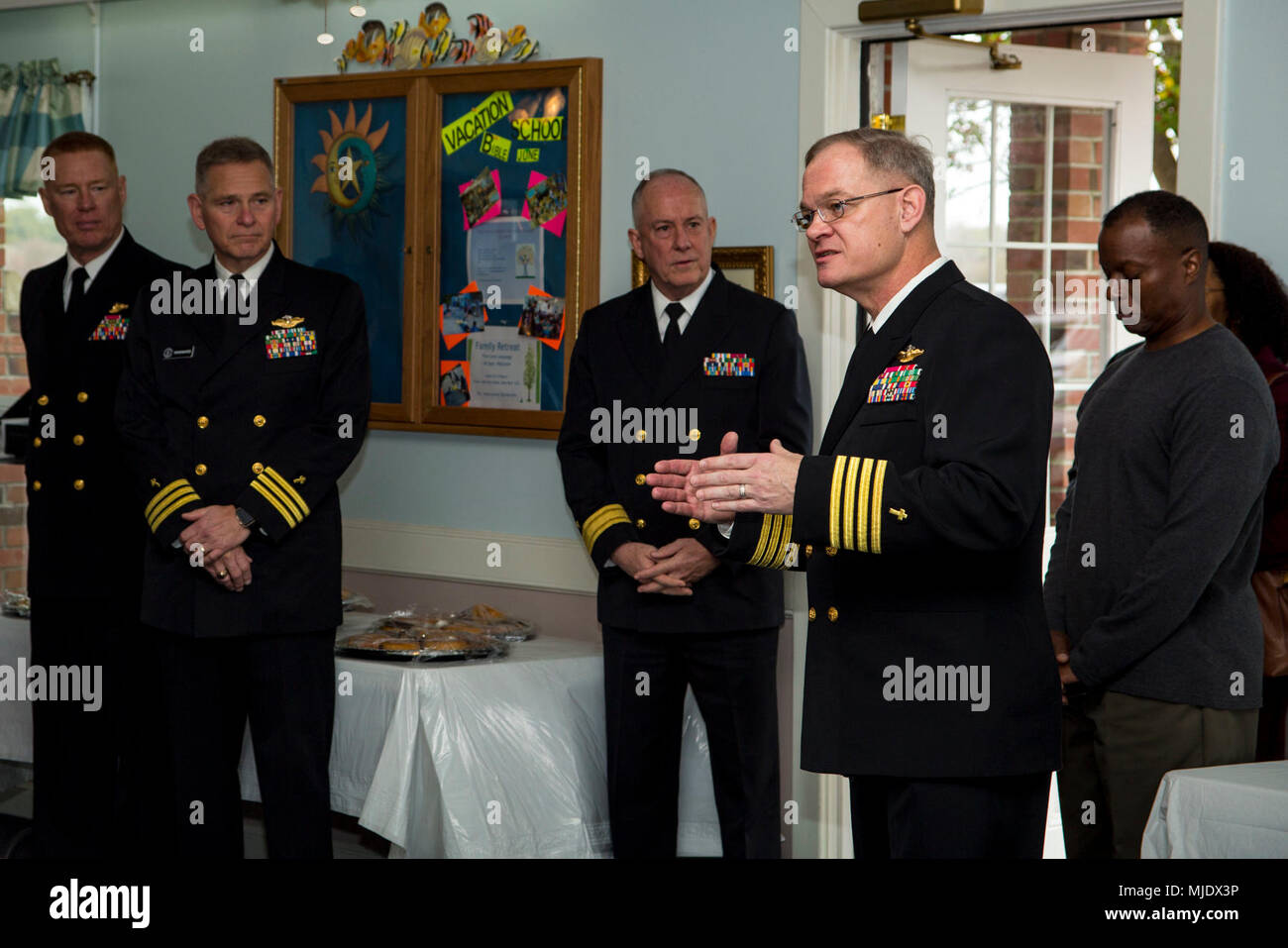 Capt. Phillip J. Hedges, right, command chaplain, Marine Corps Capt. Phillip J. Hedges, right, command chaplain, Marine Corps