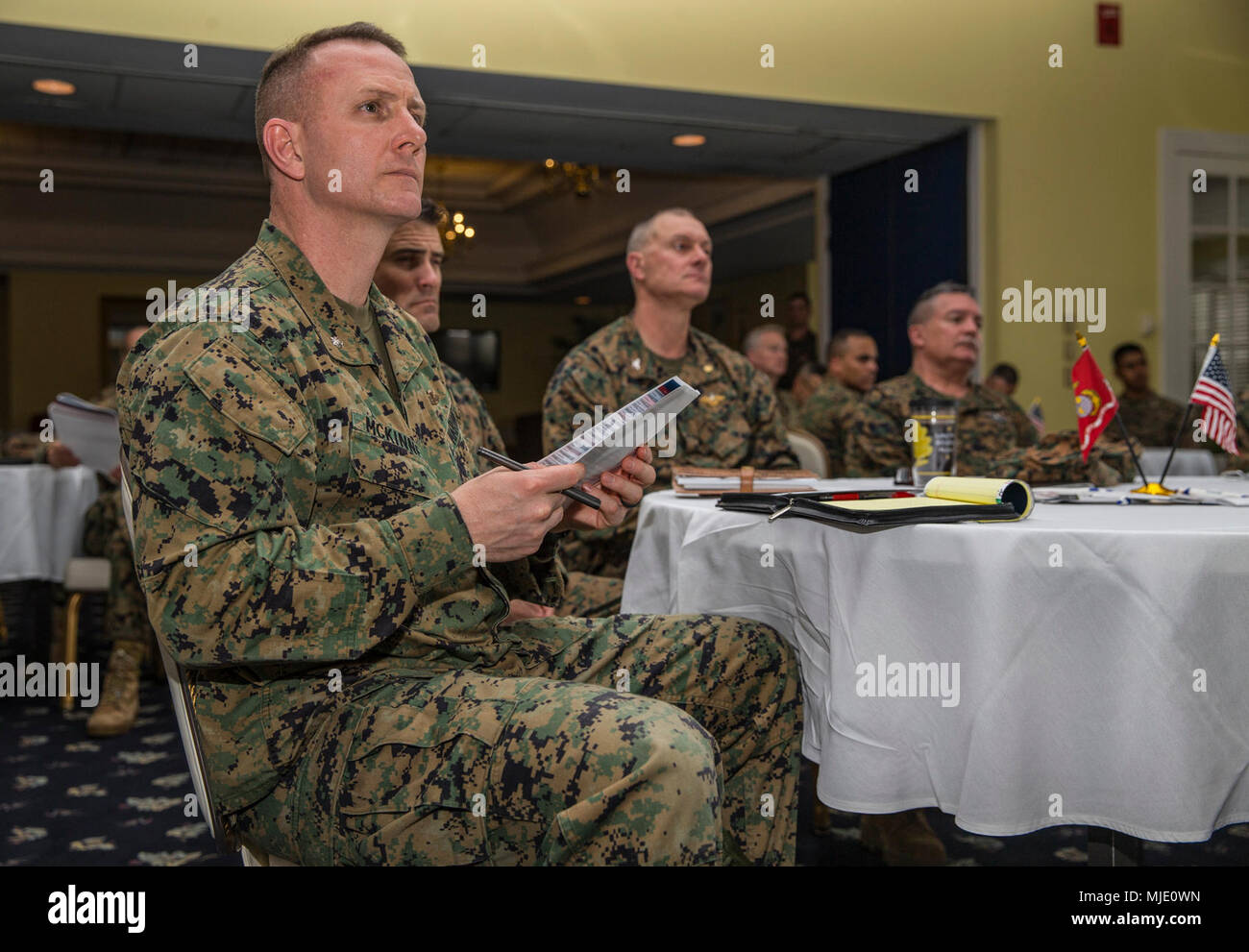 Lt. Col. Matthew McKinney, logistics officer, Combat Logistics Regiment 2, 2nd Marine Logistics Group, attends the Navy-Marine Corps Relief Society kick off at the Officer's Club on Marine Corps Base Camp Lejeune, N.C., Feb. 20, 2018. The NMCRS is a program that provides financial, educational, and other assistance to members of the Naval Service of the United States. (U.S. Marine Corps Stock Photo