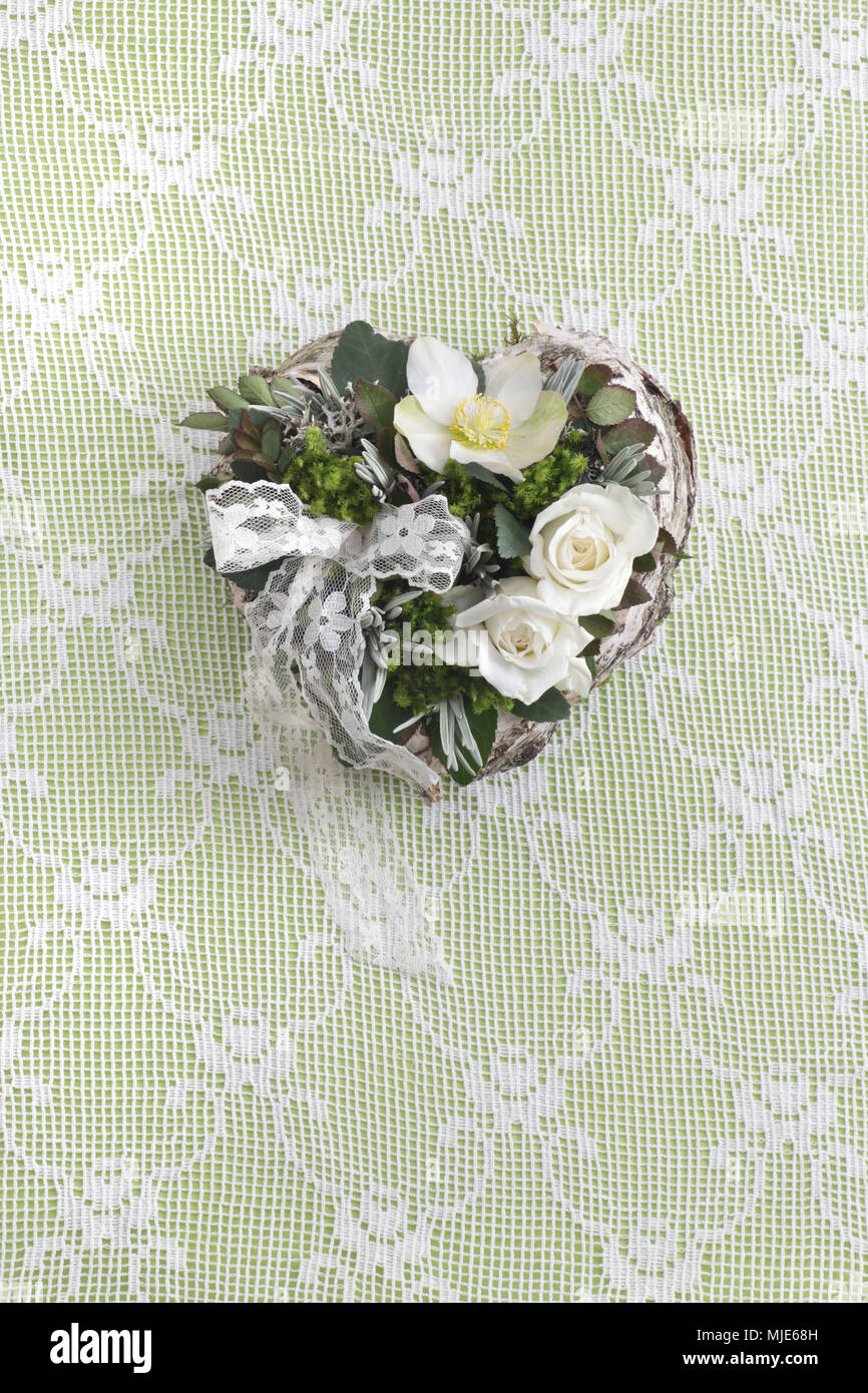 Heart winter magic with white roses and christmas rose hires stock photography and images Alamy