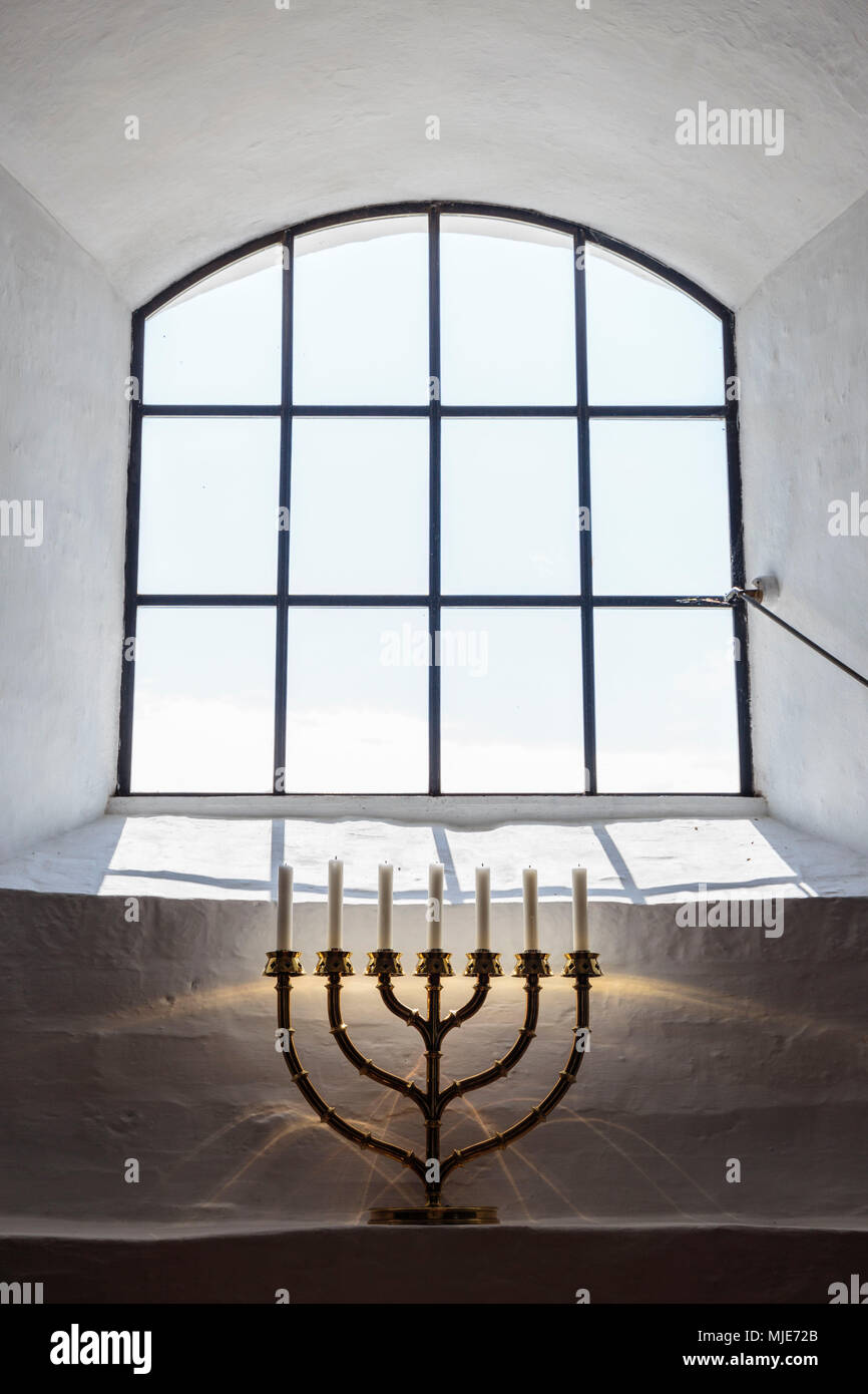 Seven-branched candelabrum and window in the Ny Kirke (12th century), Europe, Denmark, Bornholm, Nyker, Stock Photo