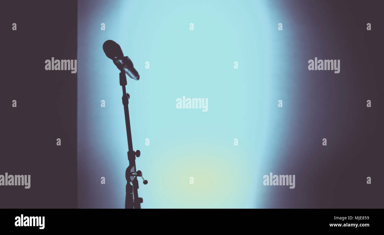 Colours on stage, light and show technology, the microphone - mystical, lonely, before the performance, Stock Photo