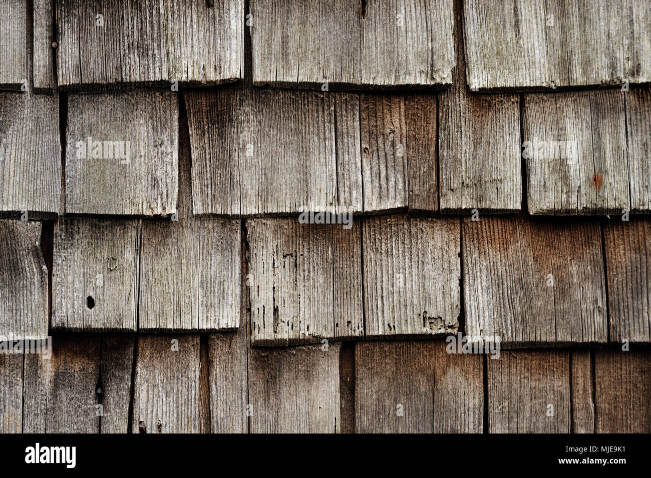 old shingles, grey and weathered on a wooden house in the Black Forest, detail Stock Photo