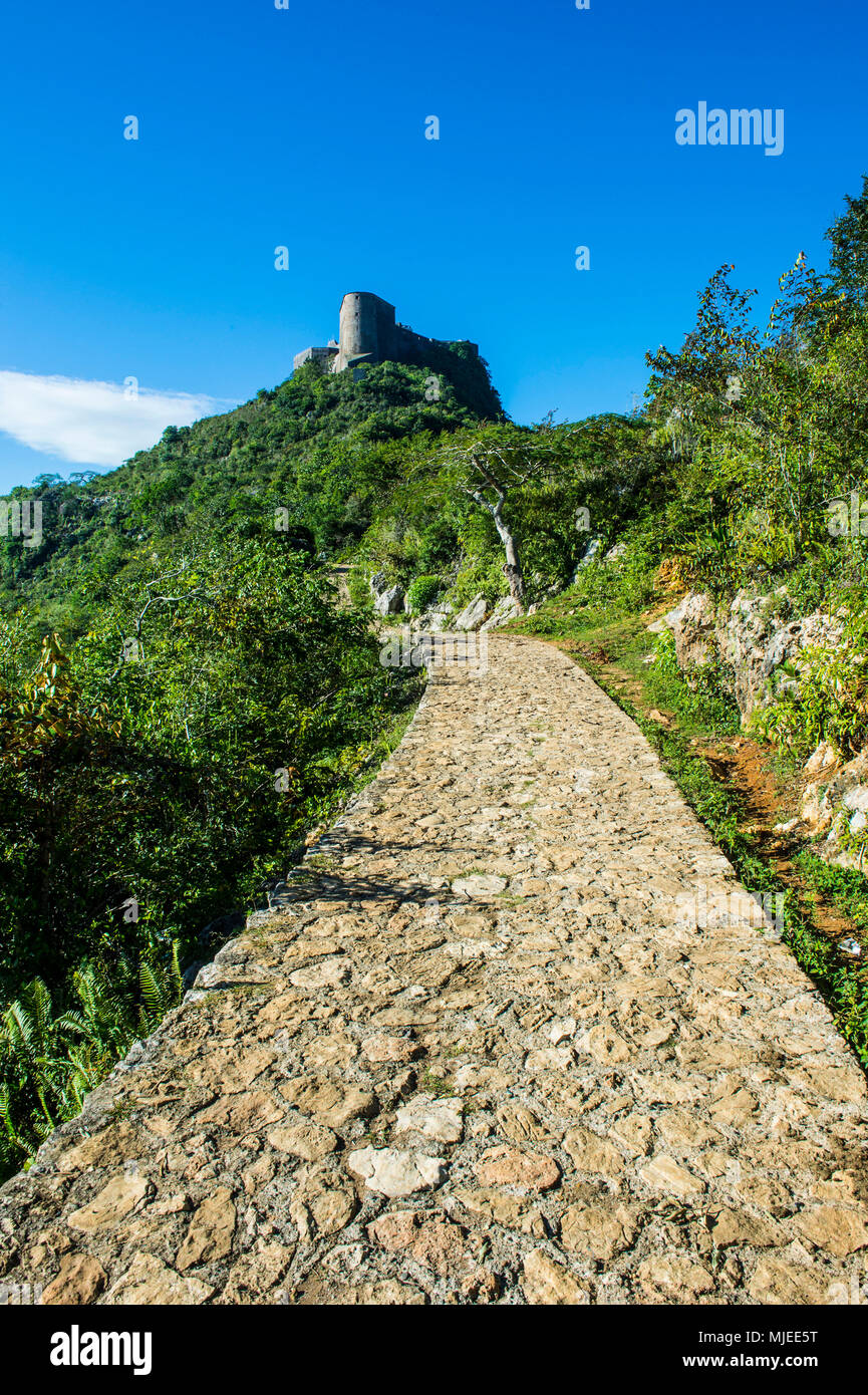 Cobblestone road leading up to the Unesco world heritage sight the  Citadelle Laferriere, Cap Haitien, Haiti, Caribbean Stock Photo
