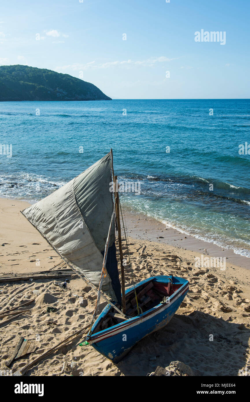 Little fishing boat on a remote beach, Labadie,  Cap Haitien, Haiti, Caribbean Stock Photo