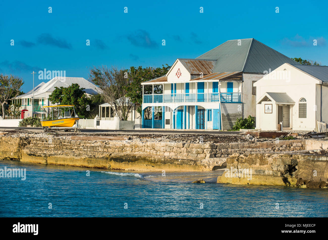 View of the beachfront with the colonial houses of Cockburn town, Grand Turk, Turks and Caicos Stock Photo