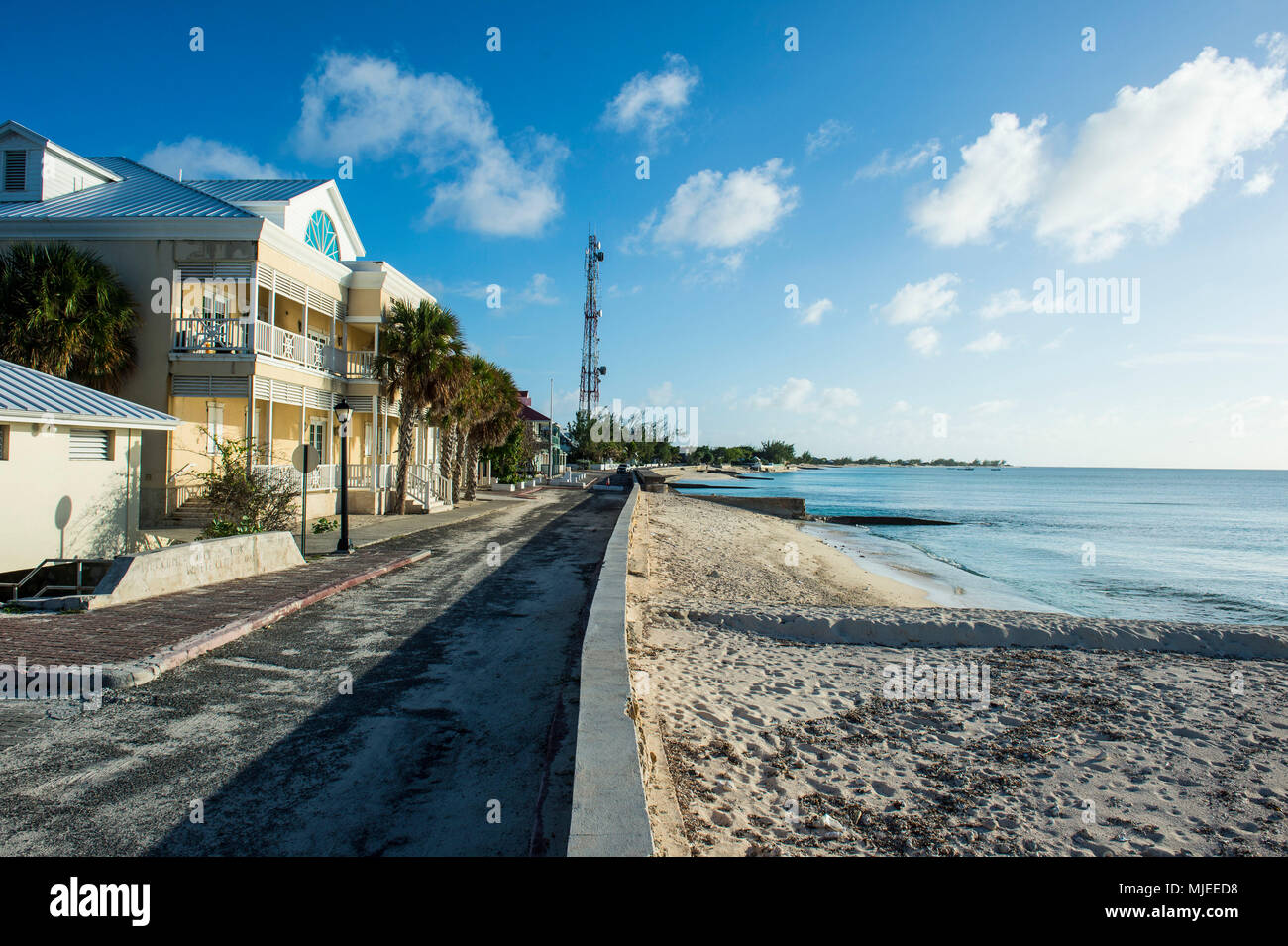View of the beachfront with the colonial houses of Cockburn town, Grand Turk, Turks and Caicos Stock Photo