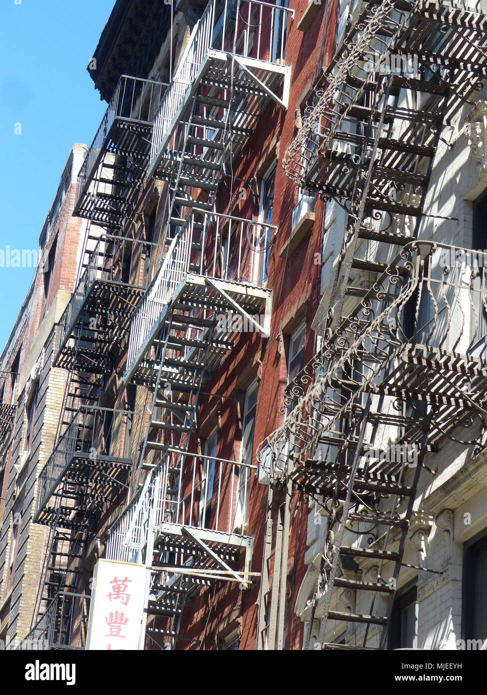 A fire escape of a building in New York City Stock Photo