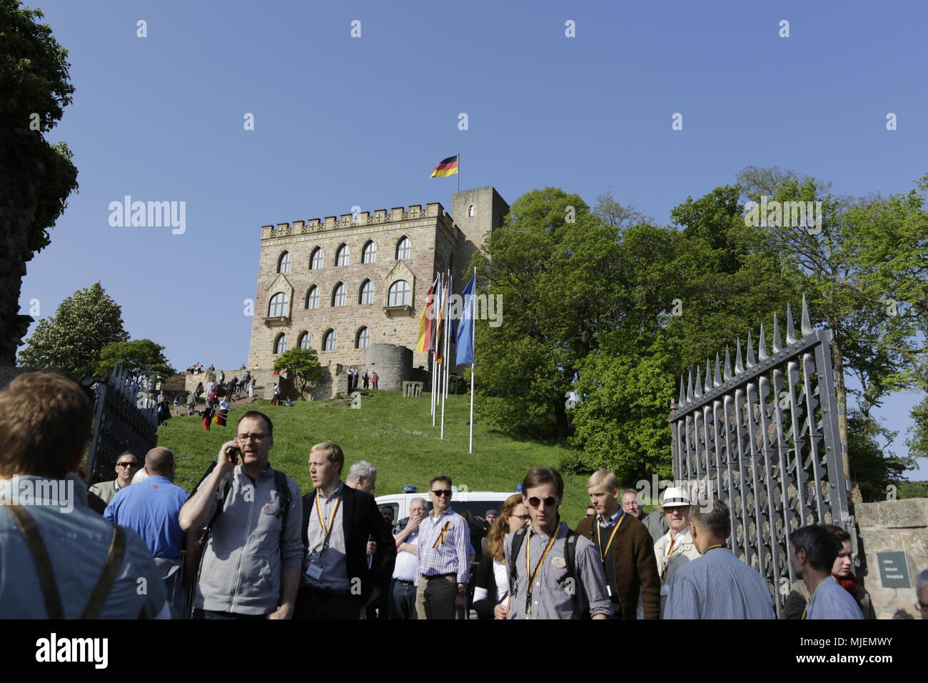 Neustadt, Germany. 5th May 2018. People queue outside the Haibach castle to get into it for the New Hambach Festival. The New Hambach Festival, organised by national-conservative and members of the new right, took place at the Hambach Castle. Organised by controversial Christian Democratic Union of Germany) member and Alternative for Germany) sympathiser Max Otte, it sees controversial speakers such as Thilo Sarrazin, Vera Lengsfeld and Federal spokesman for the AfD Jorg Meuthen. Credit: Michael Debets/Alamy Live News Stock Photo