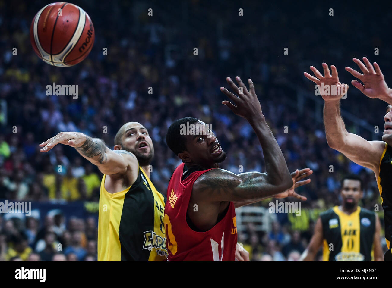 04 May 2018, Greece, Athens: Basketball, Champions Legaue, Final Four,  semi-final, AEK vs UCAM Murcia: Ovie Soko (C) in action in action. Photo:  Angelos Tzortzinis/dpa Photo: Photo: Angelos Tzortzinis/dpa Stock Photo -