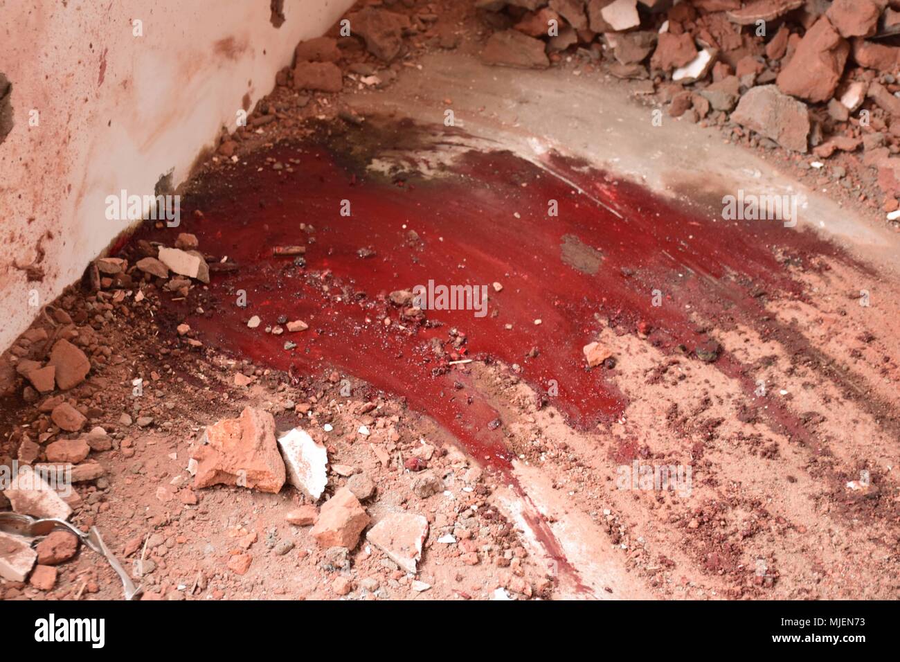 May 5, 2018 - Srinagar, Jammu & Kashmir, India - (EDITORS NOTE: Image contains graphic content) Blood scattered over the floor of Residencial house which was gutted during Encounter.4 Killed and several injured in an encounter between Indian forces and militants at chatabal area of Srinagar summer capital of Indian Kashmir on Saturday. Three militants were killed during a brief shootout after government forces laid seige around densely populated chatabal area of Srinagar. A young man also died after he was hit by the armoured vehicle during the clashes between the residents and police force a Stock Photo