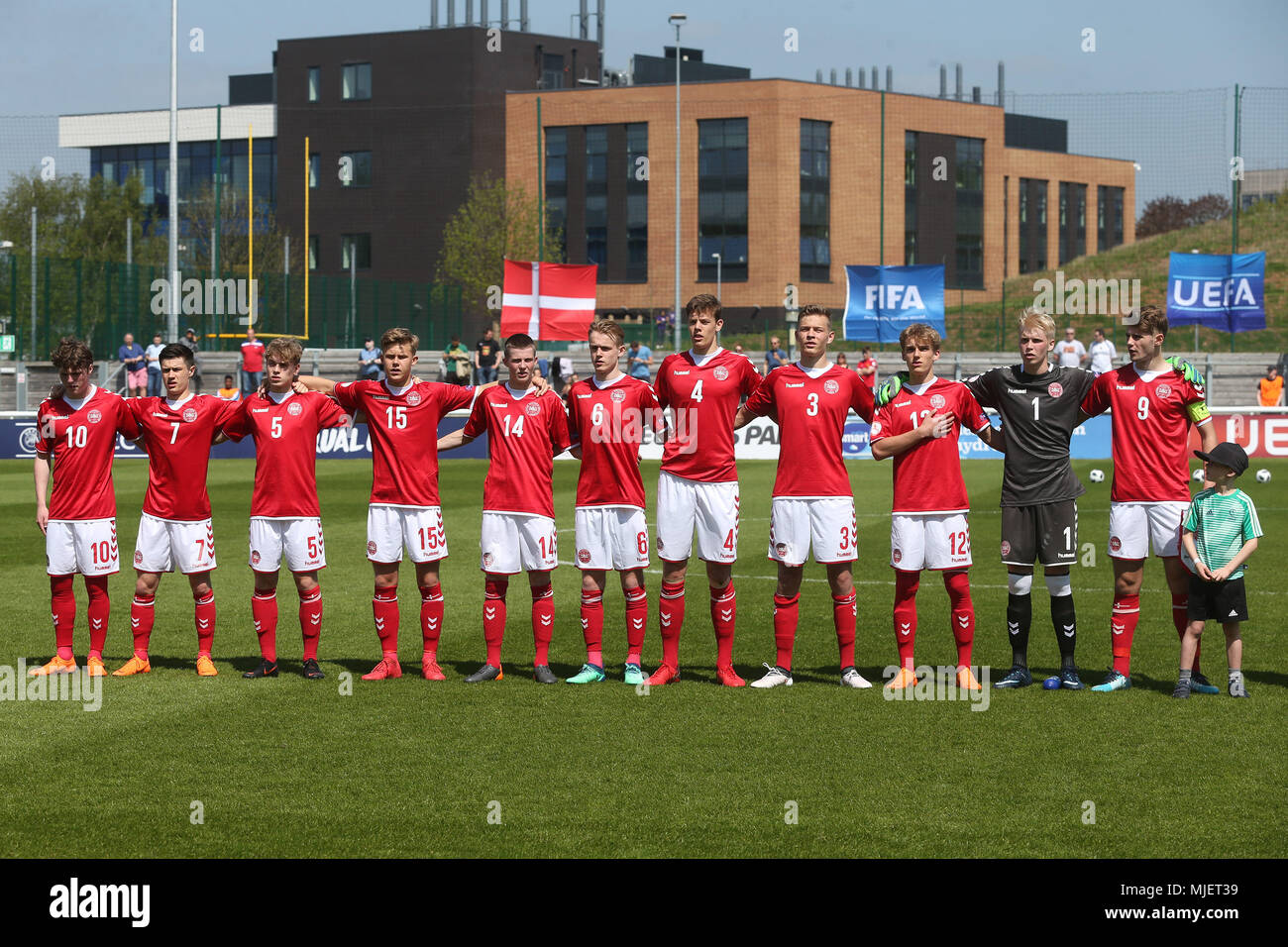 Loughborough, UK. 5th May, 2018. The Danish team sing the National Anthem before the 2018 UEFA European Under-17 Championship Group C match between Denmark and Bosnia and Herzegovina at Loughborough University Stadium on May 5th 2018 in Loughborough, England. (Photo by Paul Chesterton/phcimages.com) Credit: PHC Images/Alamy Live News Stock Photo
