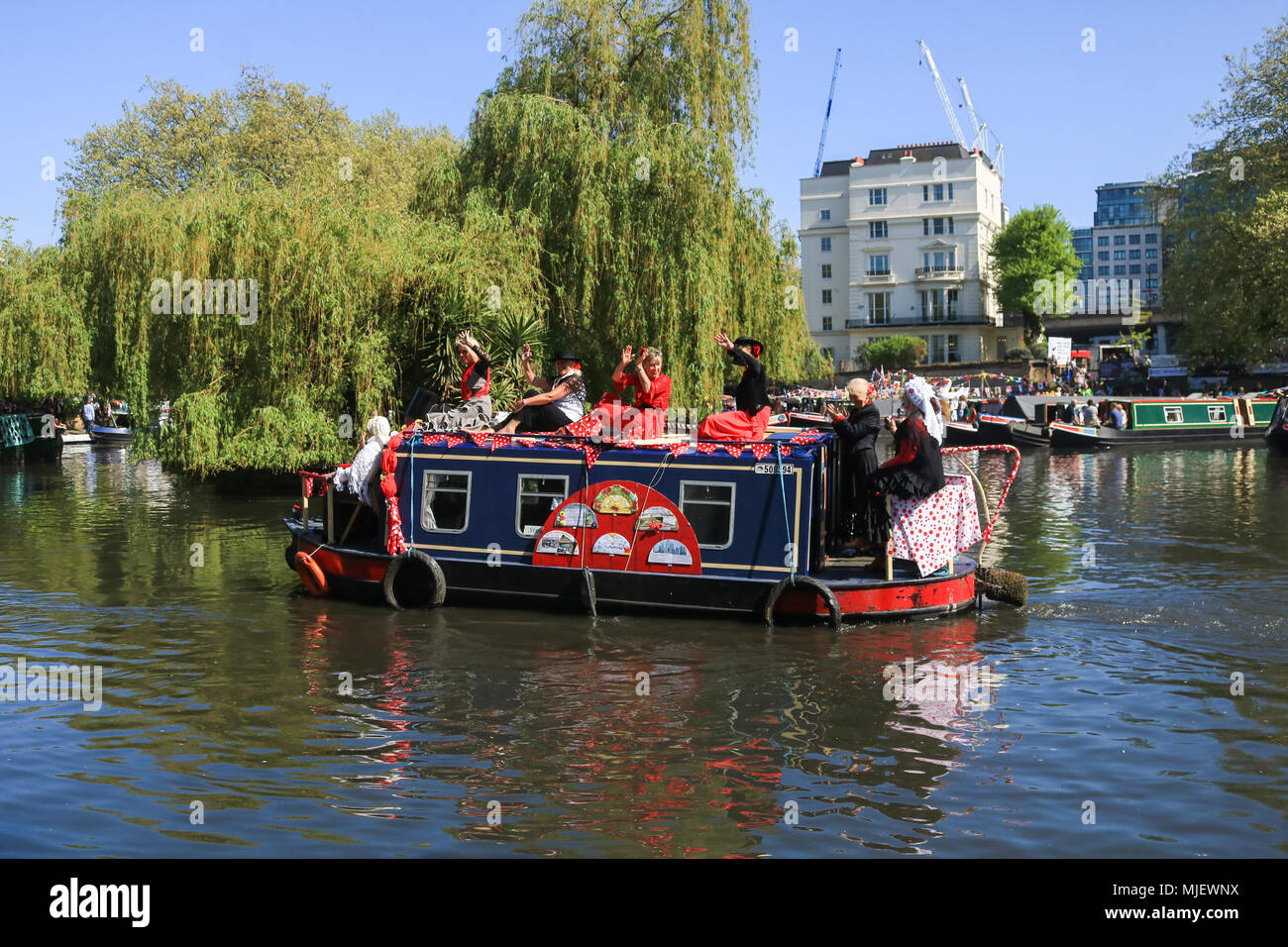 London, UK. 5th May, 2018. Little Venice, London .Over 100 canal boats take part in a pageant and competition from May 5-7th in Grand Junction Canal, Little Venice  for the festival  as part of  the Inlands Water Association (IWA) Canalway Cavalcade held over the May Bank Holiday weekend is London's biggest, brightest  and best waterways festival  with an array of boats, trade show stalls and boat gatherings  which has been taking place at Little Venice  in North London since 1983. Credit: amer ghazzal/Alamy Live News Stock Photo