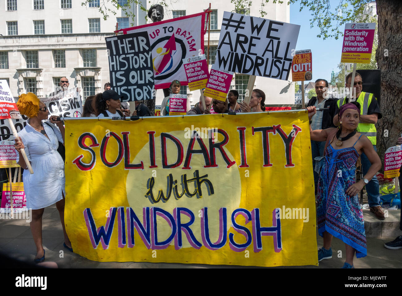 London, UK, 5th May 2018, Demonstrators attend a march for Windrush opposite Downing Street in an attempt to overturn the governments immigration policy stating Theresa May's current policy is racist. Credit: adrian looby/Alamy Live News Stock Photo