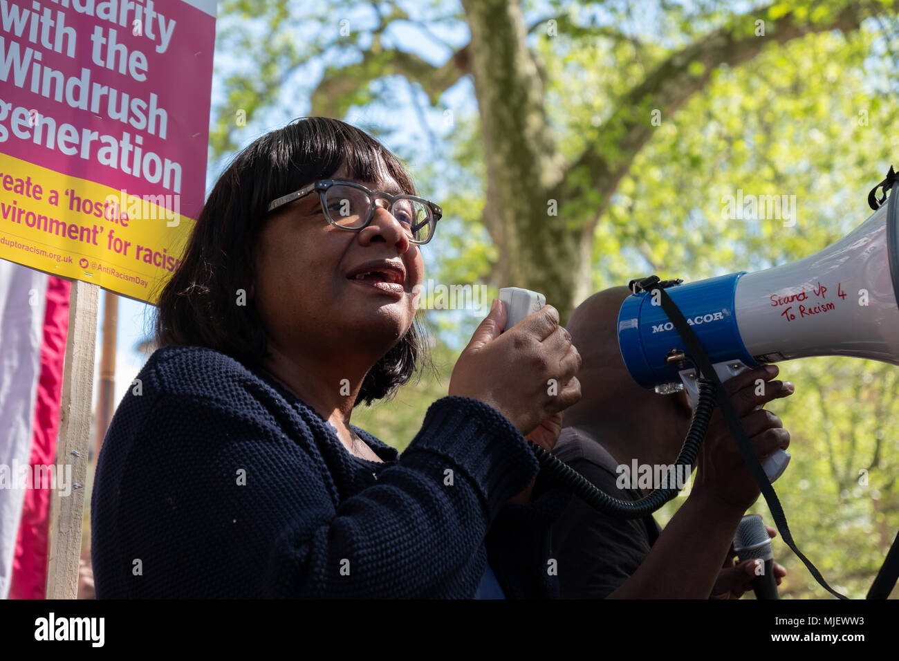London, UK, 5th May 2018, Demonstrators attend a march for Windrush opposite Downing Street in an attempt to overturn the governments immigration policy stating Theresa May's current policy is racist. Diane Abbott MP gives a speech to the attendees Credit: adrian looby/Alamy Live News Stock Photo