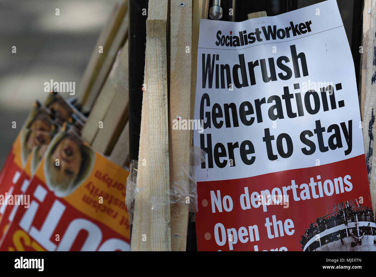 Whitehall, London, UK. 5th May 2018. Windrush Generation protest opposite Downing Street demanding that the Immigration Act be scrapped. Credit: Matthew Chattle/Alamy Live News Stock Photo