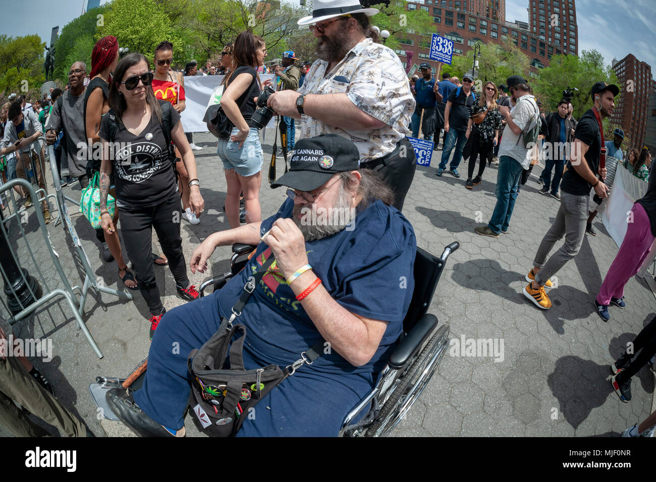 New York, USA. 5th May, 2018. Yippie Pieman Aaron Kaye joins advocates for the legalization of marijuana at the rally in New York on Saturday, May 5, 2018 after the annual NYC Cannabis Parade. The march included a wide range of demographics from millennials to old-time hippies. The participants in the parade are calling for the legalization of marijuana for medical treatment and for recreational uses. (© Richard B. Levine) Credit: Richard Levine/Alamy Live News Stock Photo