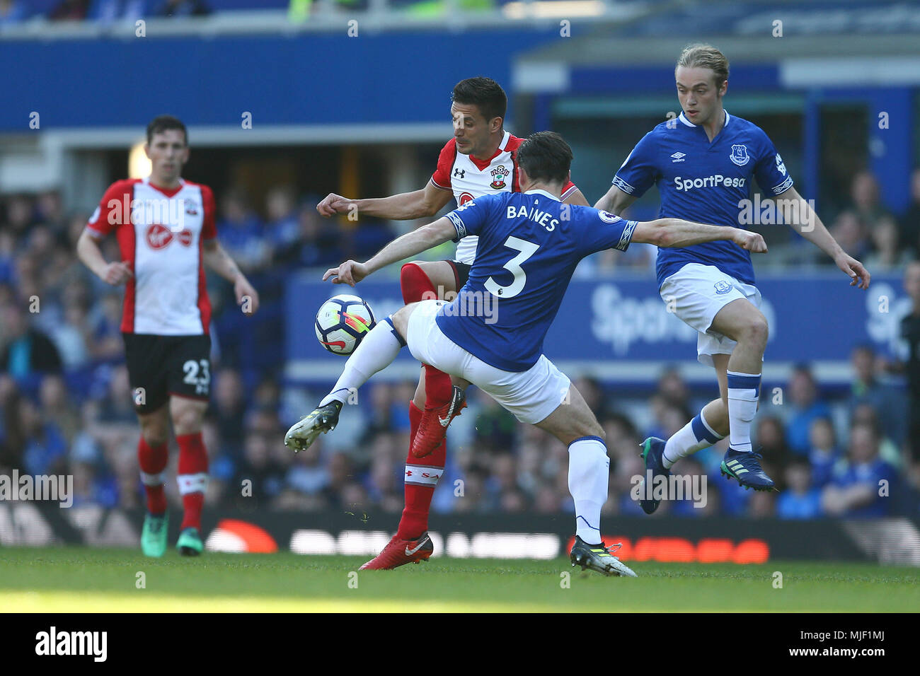Liverpool, UK. 5th May, 2018. Leighton Baines of Everton tackles Dusan Tadic of Southampton. Premier League match, Everton v Southampton at Goodison Park in Liverpool on Saturday 5th May 2018.  this image may only be used for Editorial purposes. Editorial use only, license required for commercial use. No use in betting, games or a single club/league/player publications. pic by Chris Stading/Andrew Orchard sports photography/Alamy Live news Stock Photo
