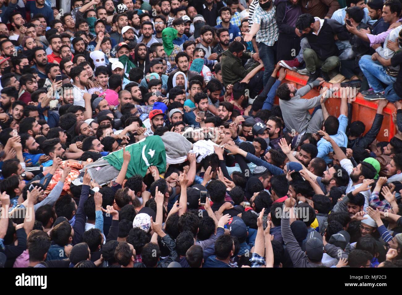 Srinagar, Jammu & Kashmir, India, May 5, 2018.  (EDITORS NOTE: Image depicts death.) People carrying body of militant Fayaz Ahmed Hamal at his residence Khankah Area of Srinagar Summer Capital Of Indian Kashmir on Saturday for burial.Multiple Funeral processions held in srinagar summer capital of Indian Kashmir on Saturday of Fayaz Ahmed Hamal a LeT (Lashkar-e-Taiba) Militant and a Civilian Adil Ahmed Yatoo who were killed by armoured vehicle on Saturday during clashes near Encounter site. Credit: ZUMA Press, Inc./Alamy Live News Stock Photo