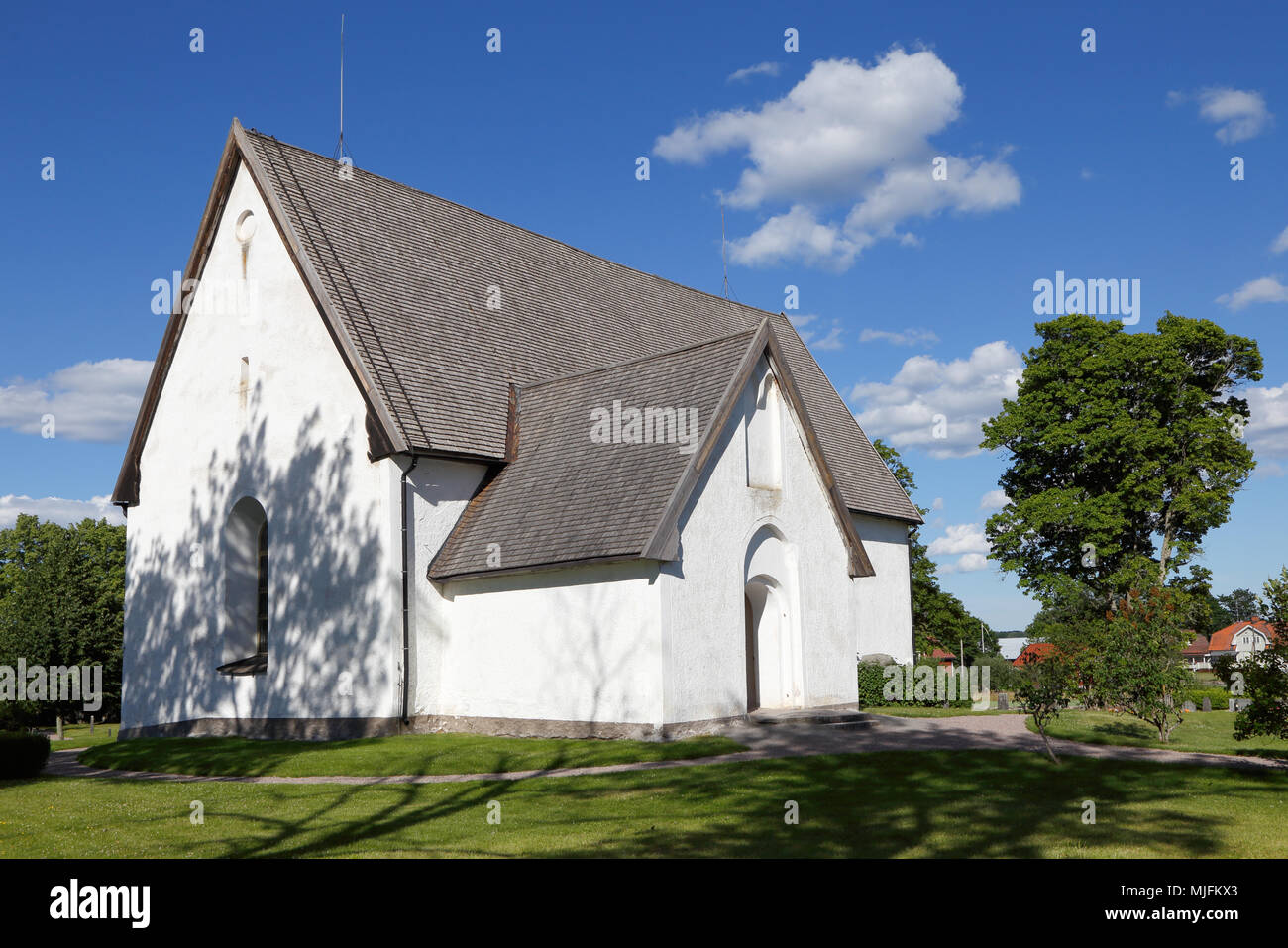 Exterior of the Ostuna church in the Swedish province of Uppland. Stock Photo