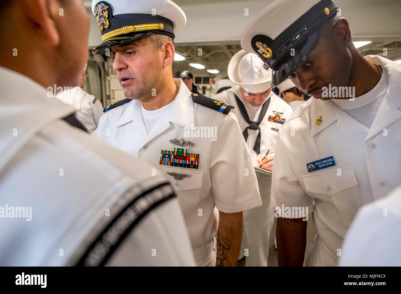 NORFOLK (March 20, 2018) Chief Warrant Officer 2 Gabrielle Arroyo, left