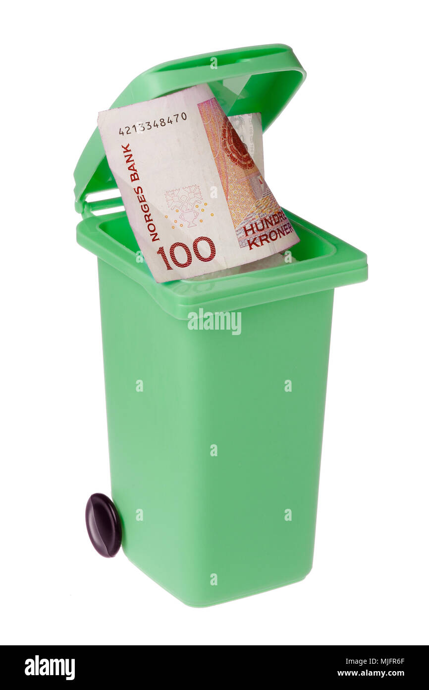 Green recycling bin with a one hundred Norwegian krona bill inside isolated on white. Stock Photo