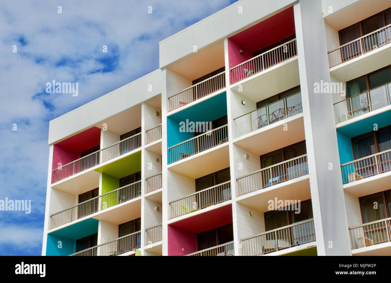 Colourful balconies on apartments in the vacation towns of Cairns in Tropical North Queensland Australia Stock Photo