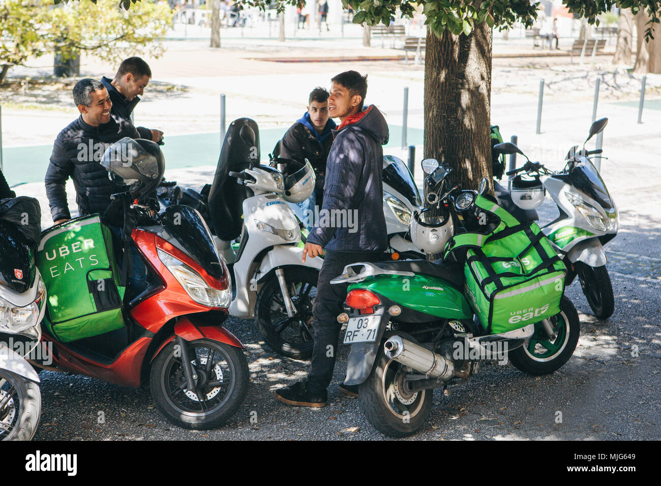 Portugal, Lisbon 29 april 2018: workers Uber Eats delivery scooter 