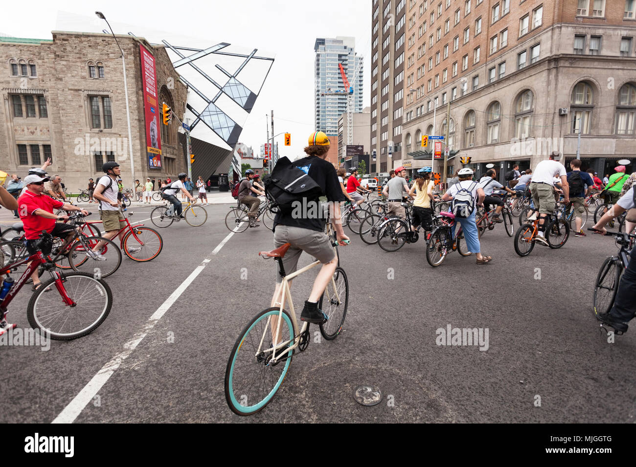A very large group of cyclists at Bloor Street and Spadina Avenue during the G20 summit in Downtown Toronto, Ontario, Canada. Stock Photo