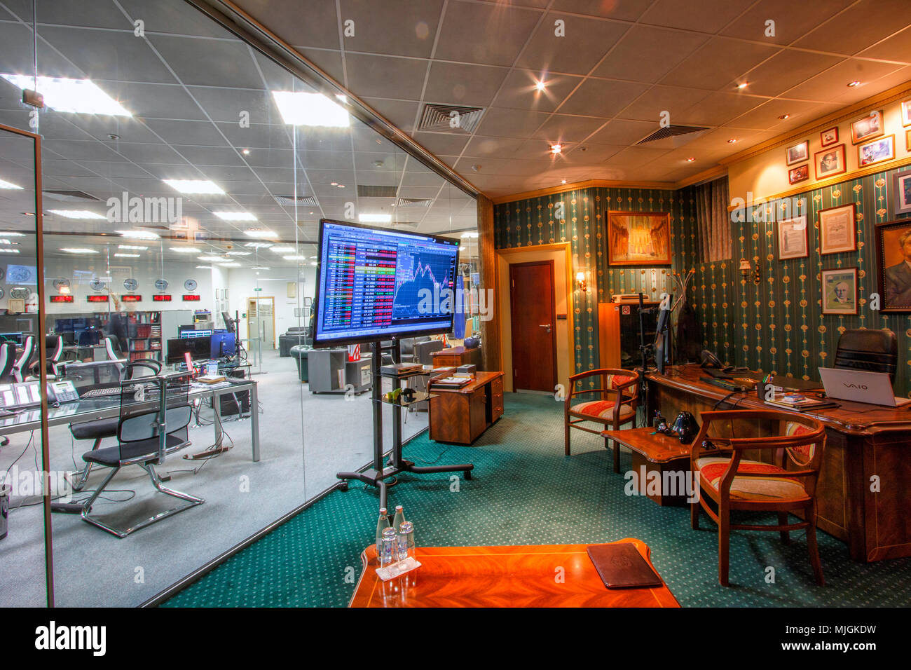 Screens showing stock charts and data analyses. Stock Photo