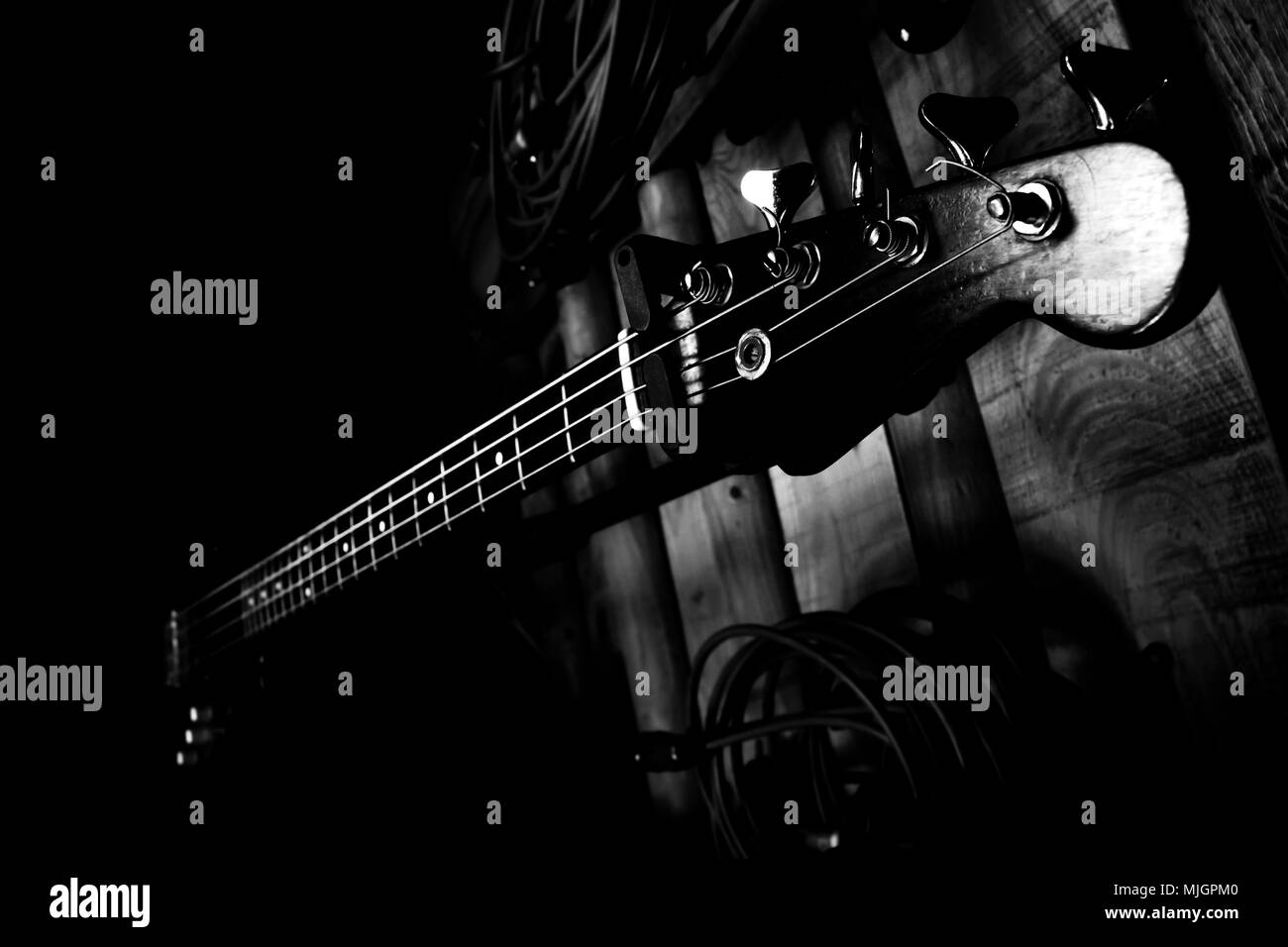 Bass Guitar In Music Studio. Musical Instruments and Equipment Stock