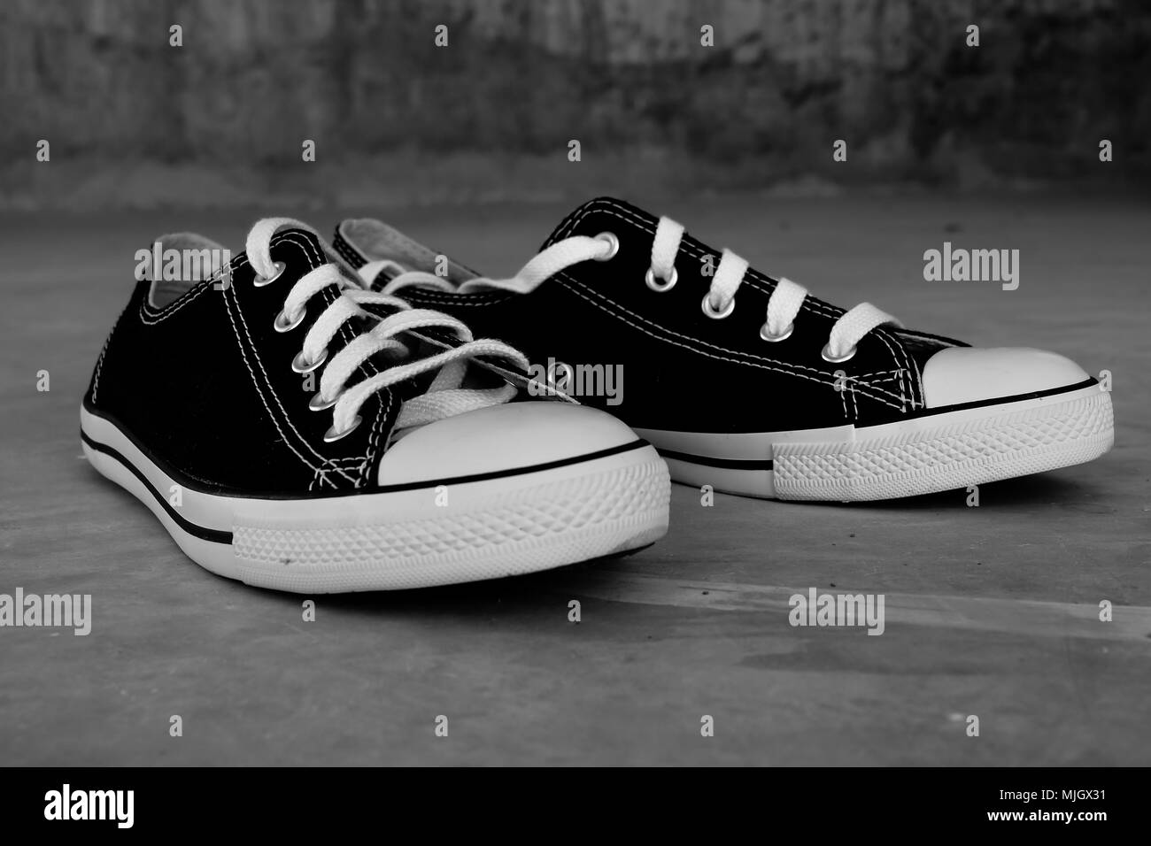 black sneakers with filter effect retro vintage style Stock Photo