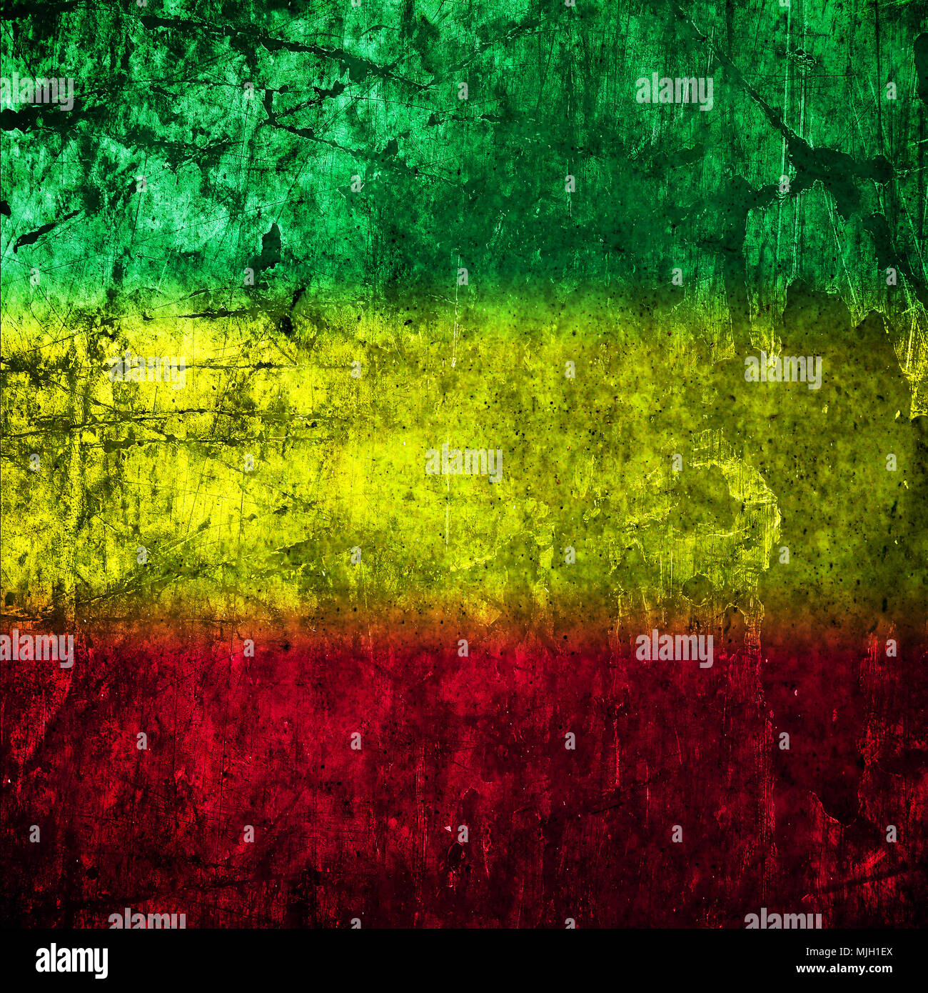 Red, yellow, green rasta flag on Concrete wall Stock Photo Alamy
