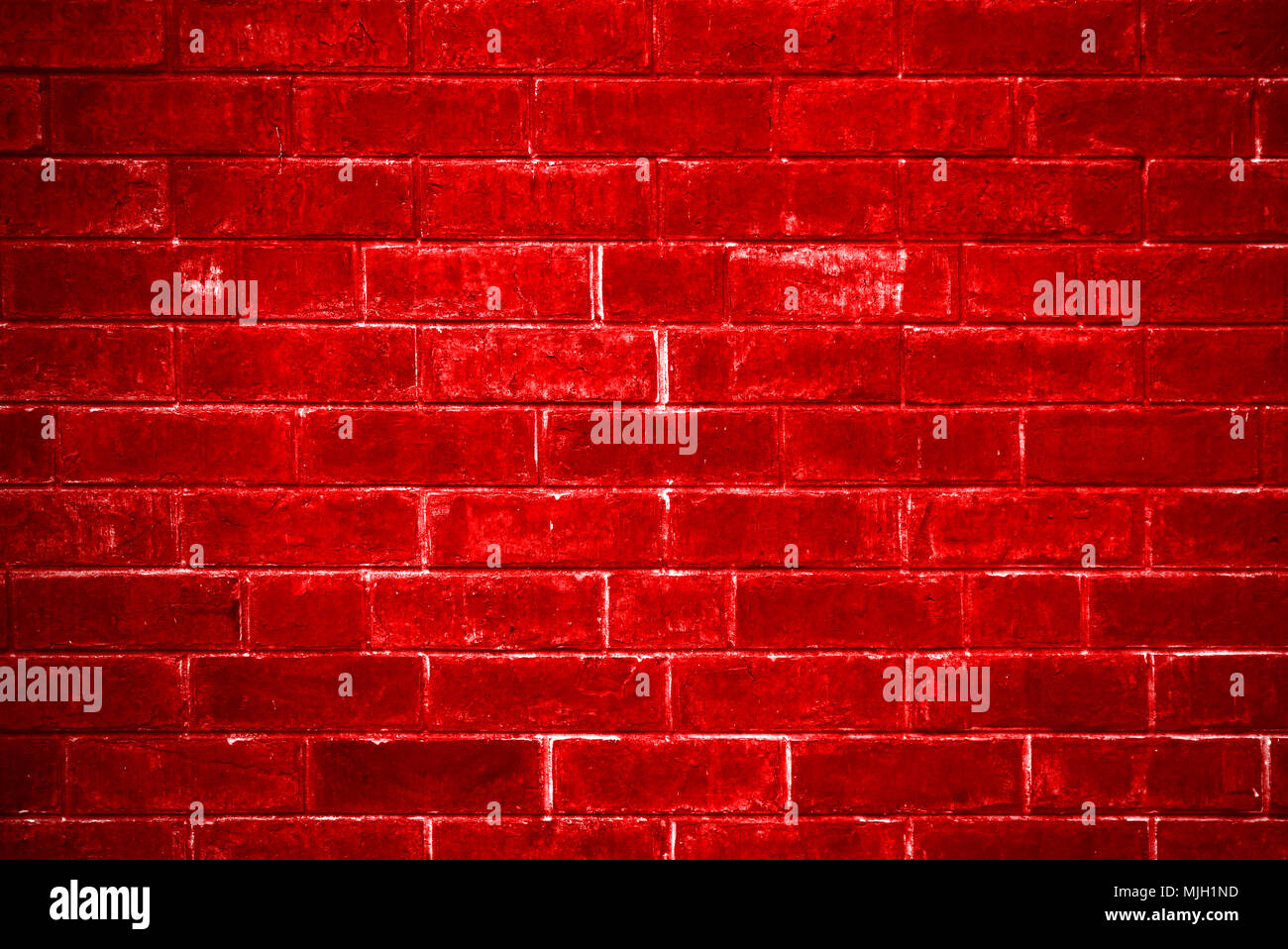red brick wall getting older from the bottom Stock Photo