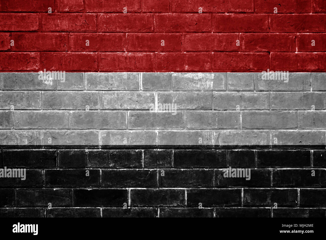 Yemen flag painted on a brick wall Stock Photo - Alamy