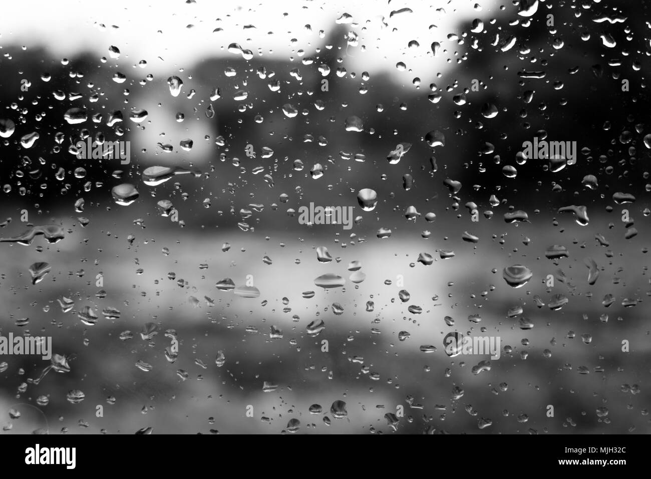 Drops of rain on glass with filter effect retro vintage style Stock Photo -  Alamy