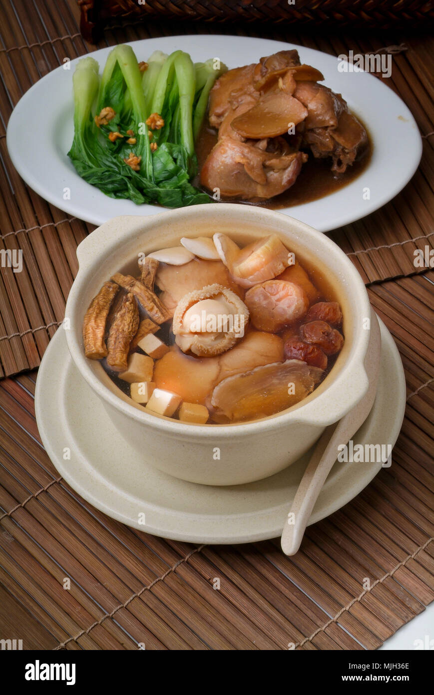 abalone and herb soup in pot, Chinese food style Stock Photo Alamy