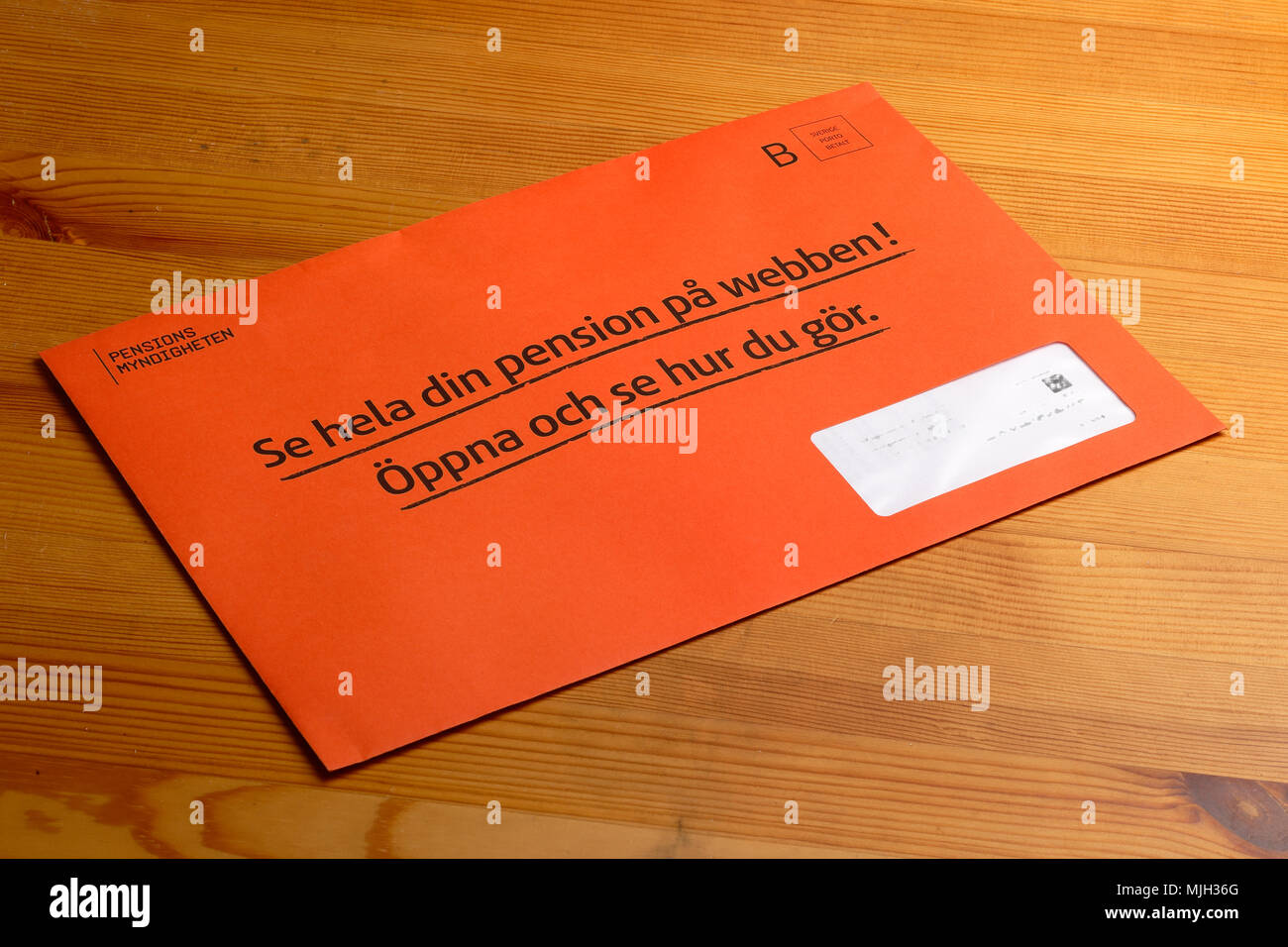 Stockholm, Sweden - March 3, 2017:The orange envelope from the Swedish Pensions Agency (Pensionsmyndigheten) containing the annual statement. Stock Photo