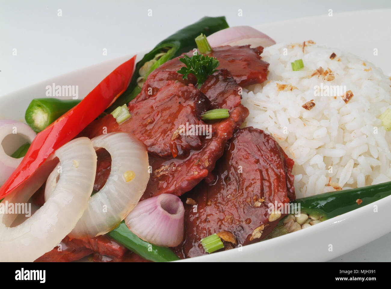 beef stir-fry with vegetable and rice asia food Stock Photo - Alamy