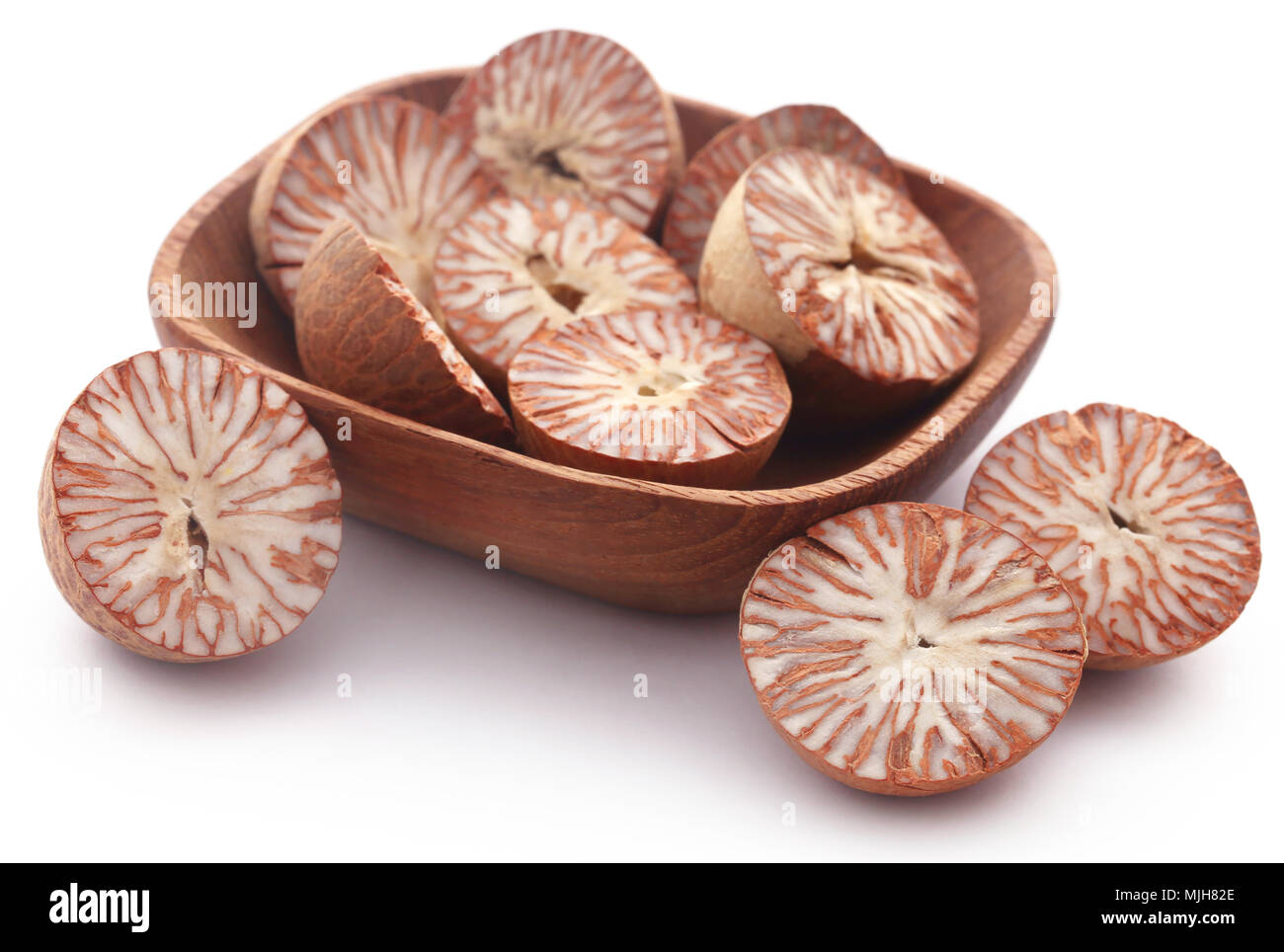 Betel nuts in a bowl over white background Stock Photo