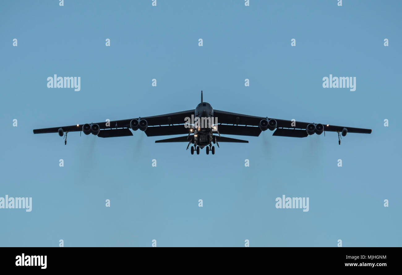 A U.S. Air Force B-52H Stratofortress, assigned to the 20th Expeditionary Bomb Squadron, deployed from Barksdale Air Force Base, La., approaches the flightline at Royal Australian Air Force (RAAF) Base Darwin, Australia, April 6, 2018. Two U.S. Air Force bombers visited the base in Australia’s Northern Territory to support the U.S. Pacific Command's Enhanced Air Cooperation (EAC) initiative in cooperation with RAAF joint terminal attack controller teams. The EAC comprises a range of air exercises and training activities designed to enhance regional cooperation, coordination and interoperabilit Stock Photo