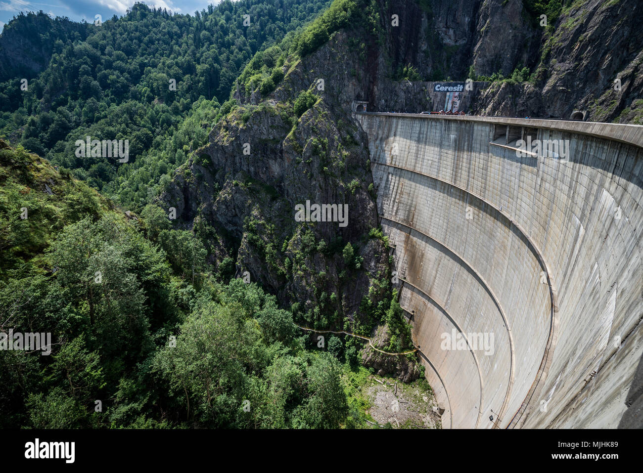 slide Bless Farmer Aerial view from Vidraru Dam - Romanian dam completed in 1966 on the Arges  River, creates Lake Vidraru Stock Photo - Alamy