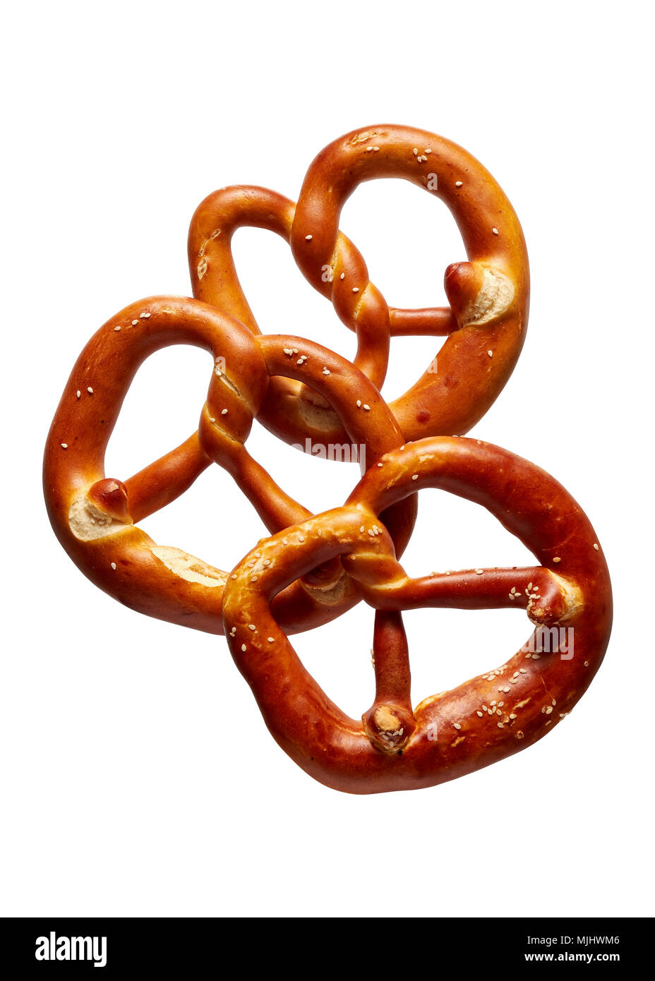 German Soft Pretzel. Three German bread pretzels on a white background