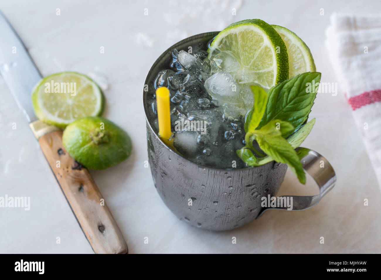 Moscow Mule Cocktail with Lime, Mint Leaves and Crushed Ice in Metal