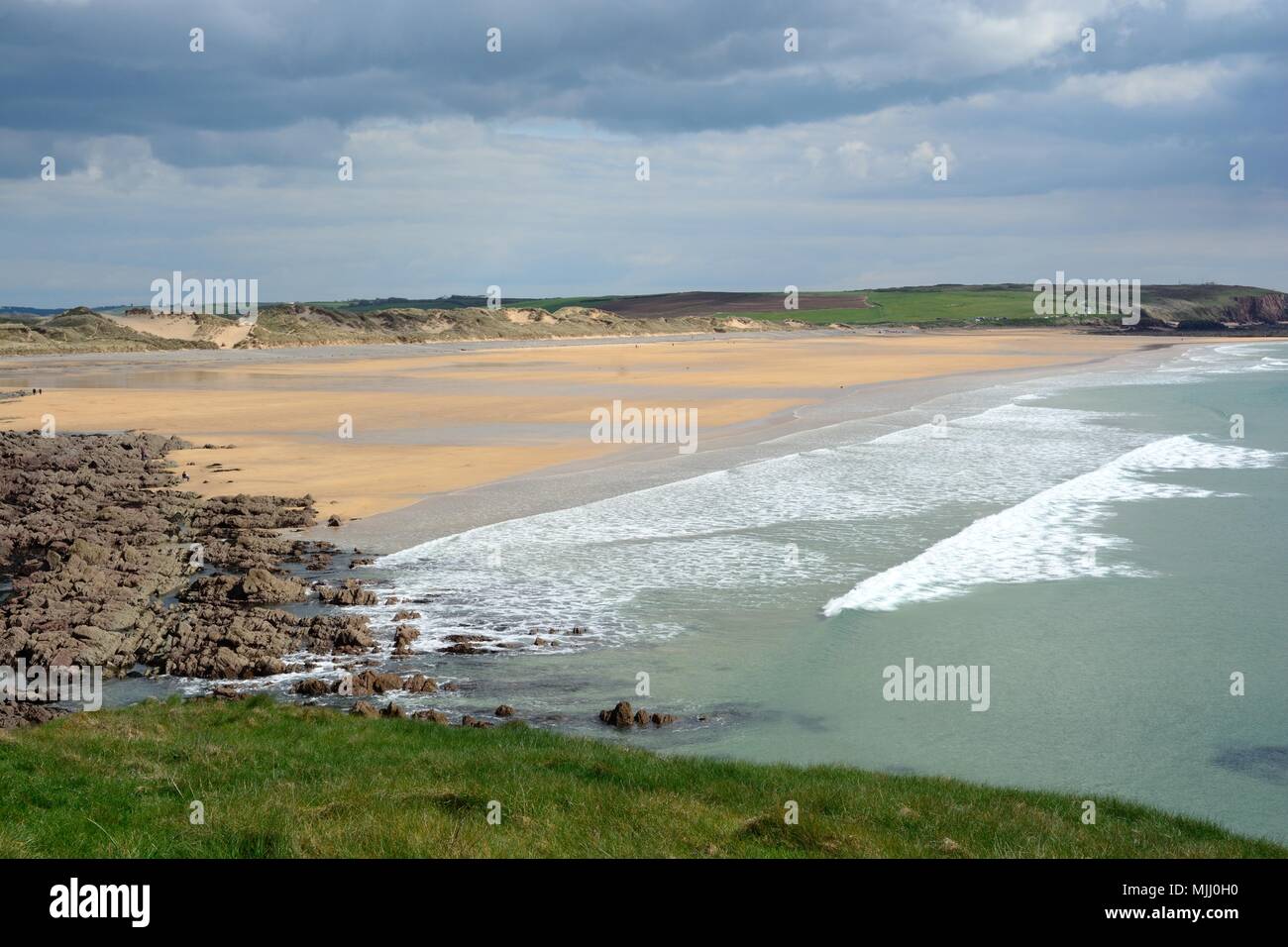 The sandy expanse of Freshwater West beach from Pembrokeshire Coast Path Wales Cymru UK GB Stock Photo
