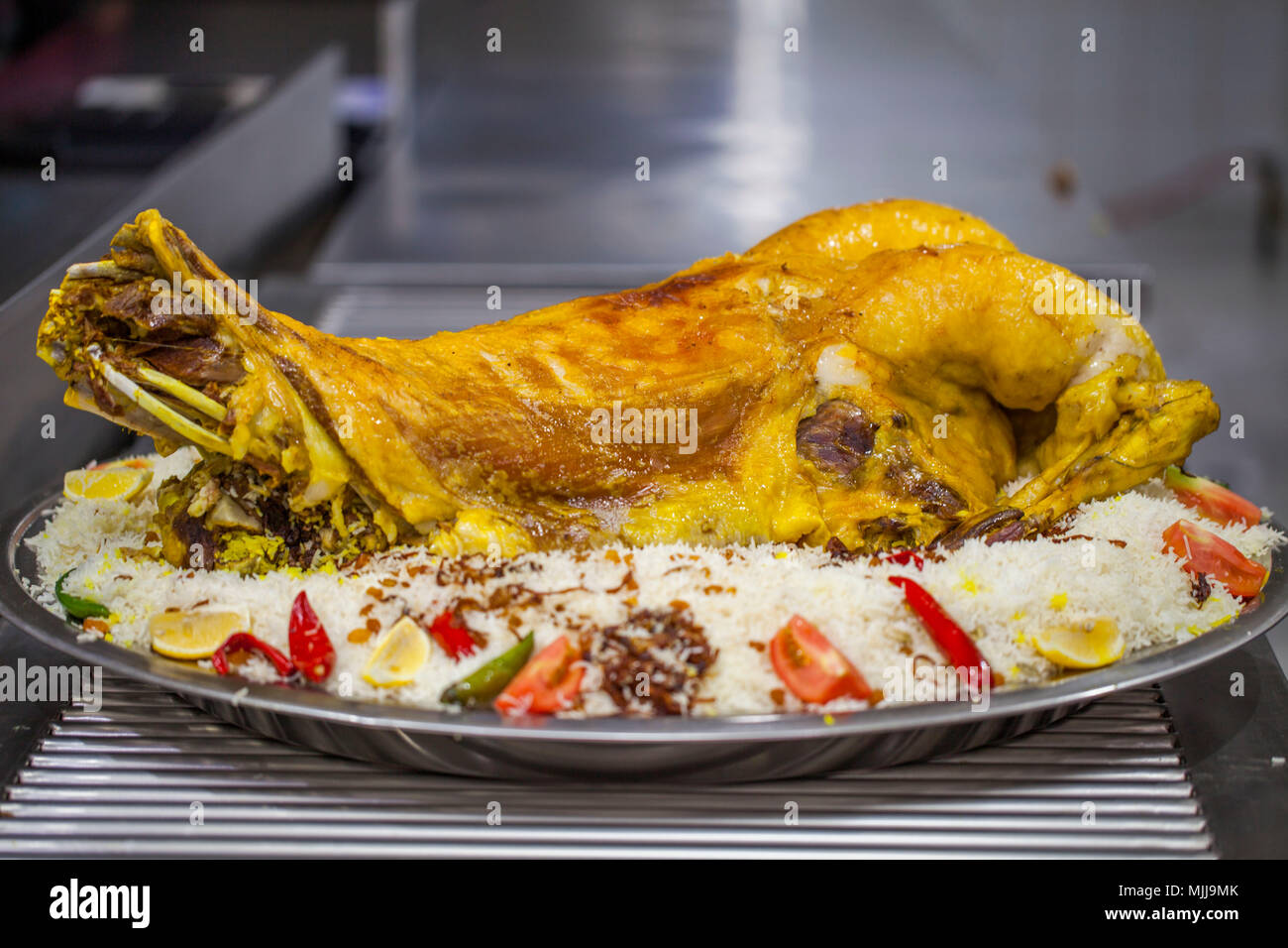 Arabic Roasted chicken with rice "Mandi Stock Photo Alamy