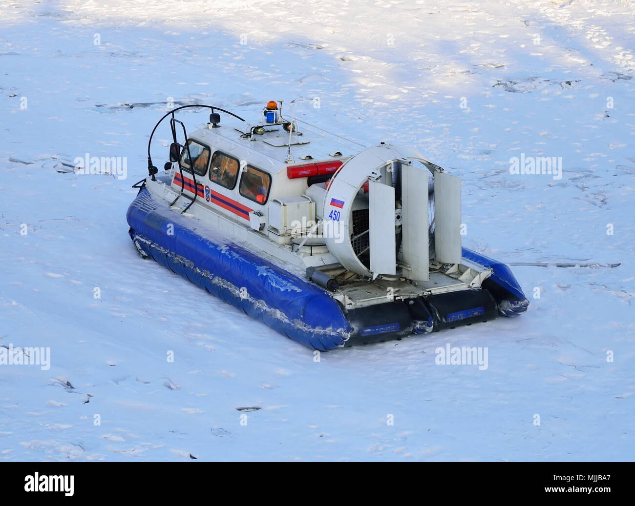 Rescue boat of the Ministry of Emergency situations on ice in winter in ...