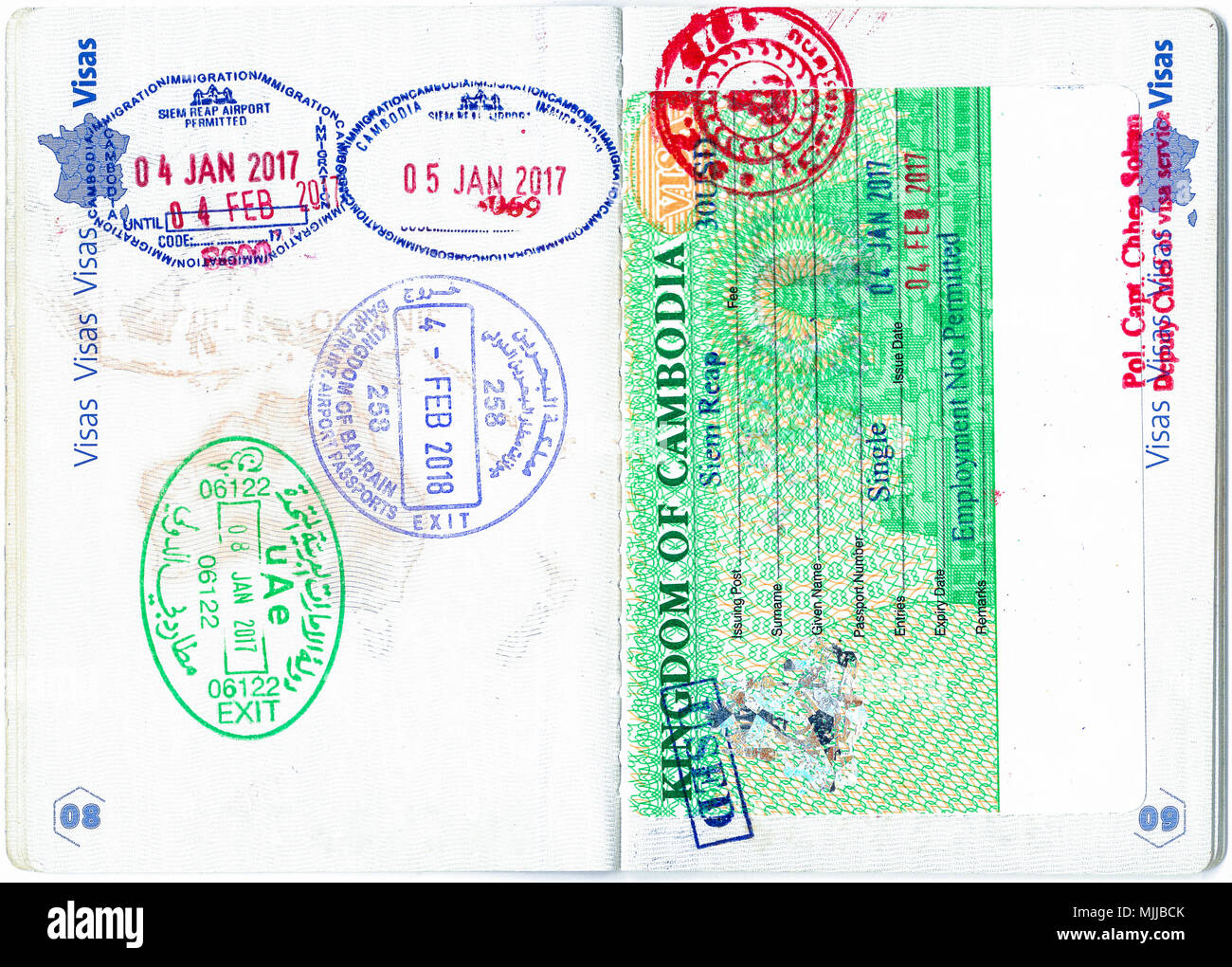 Stamps of Bahrain, the Emirates, Cambodia and a Cambodian visa in a French  passport. Personal data removed Stock Photo - Alamy